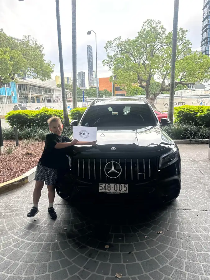 Family collecting their new Mercedes-Benz GLB, sold and financed through Simple Loans