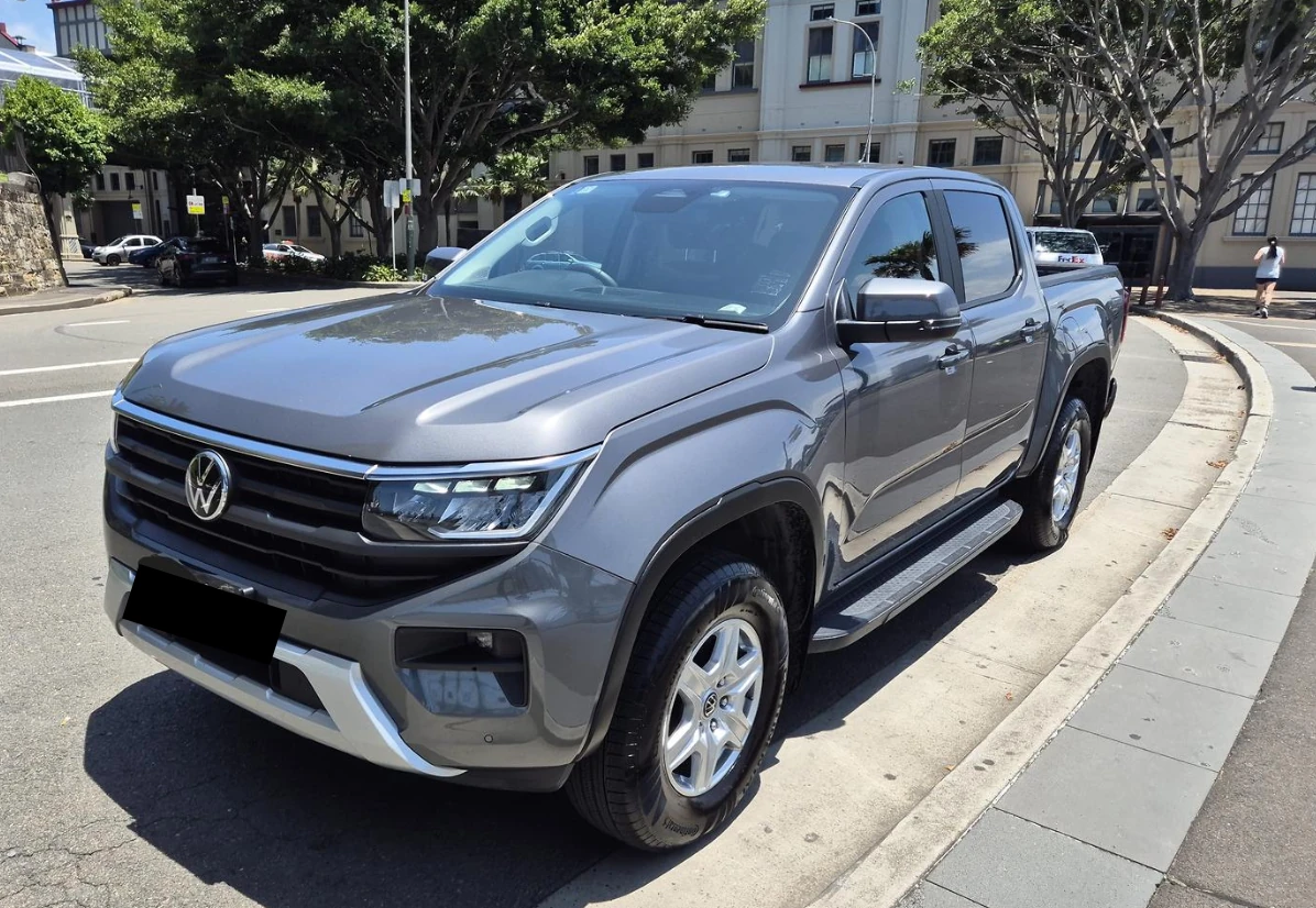 Customer's new dark Volkswagen Amarok ute financed through Simple Loans