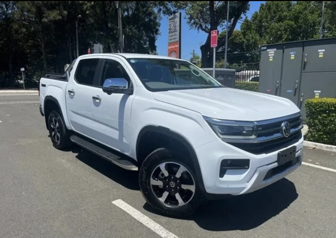 Customer's new white Volkswagen Amarok financed through Simple Loans